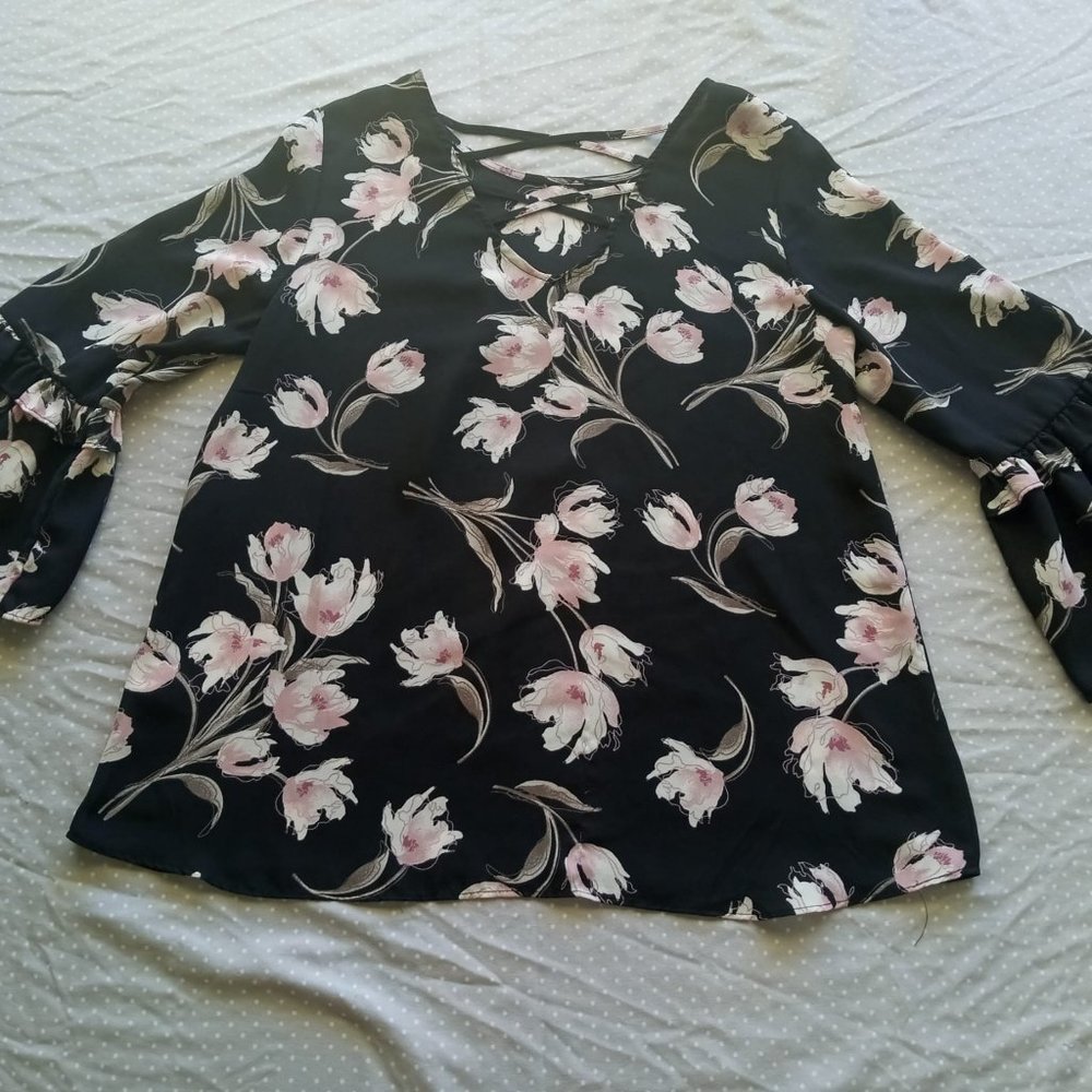 Counterparts black top with pink flowers.